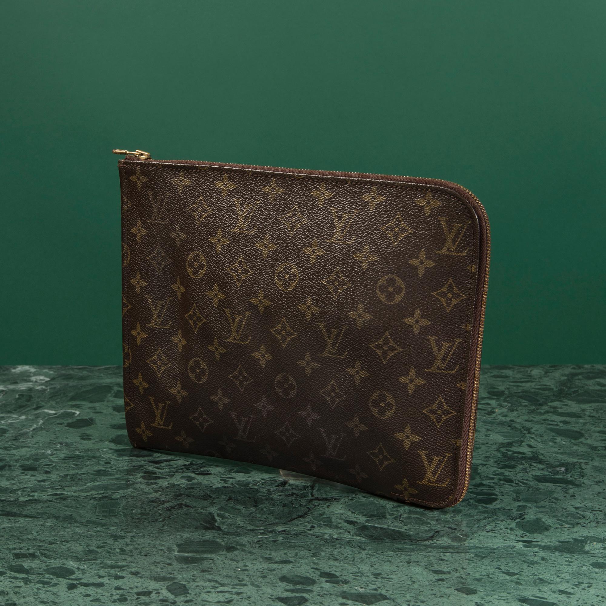 A "Pochette Documents" by  LOUIS VUITTON.