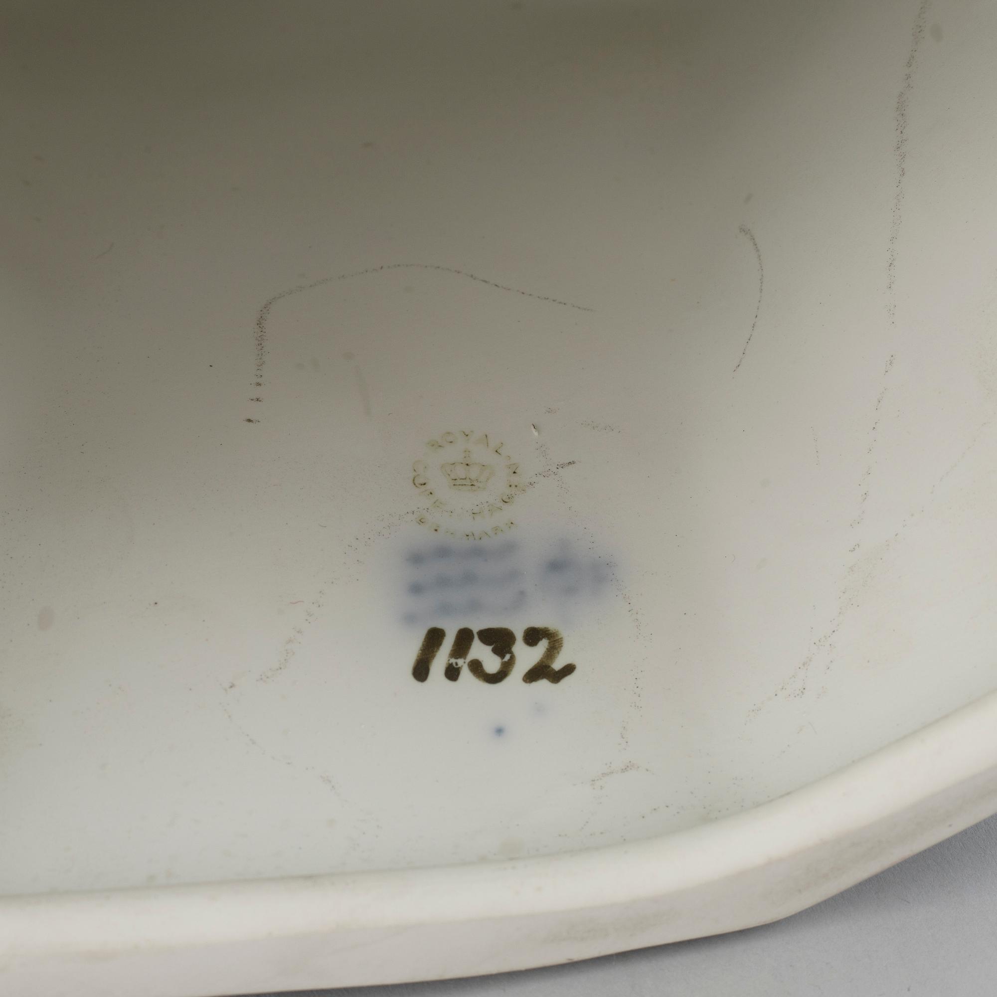 ROYAL COPENHAGEN, a porcelain figure group, 'Kyssen'.
