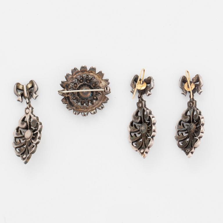 Earrings, brooch, and pendant silver with paste.