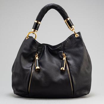 MICHAEL KORS, a black leather handbag.