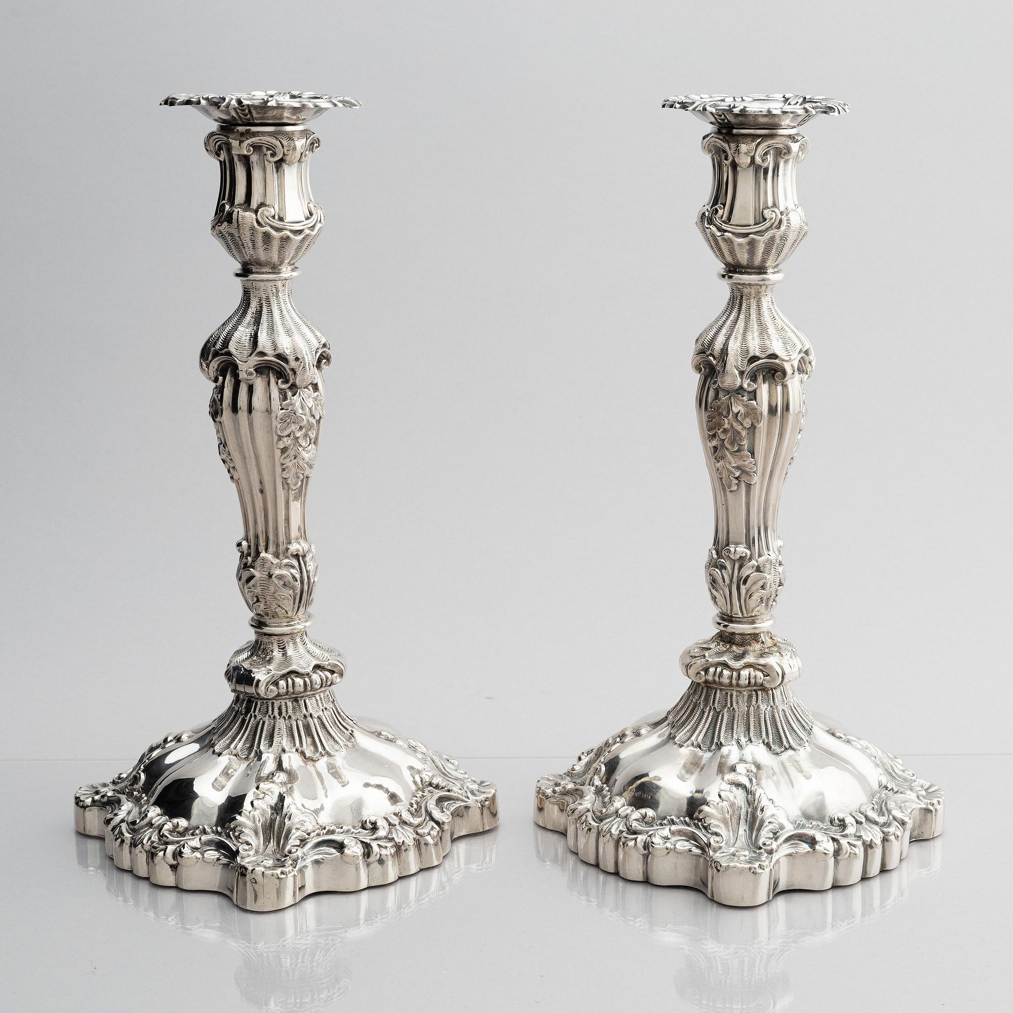 A pair of silver candlesticks, marks Gustaf Möllenborg, Stockholm 1845.