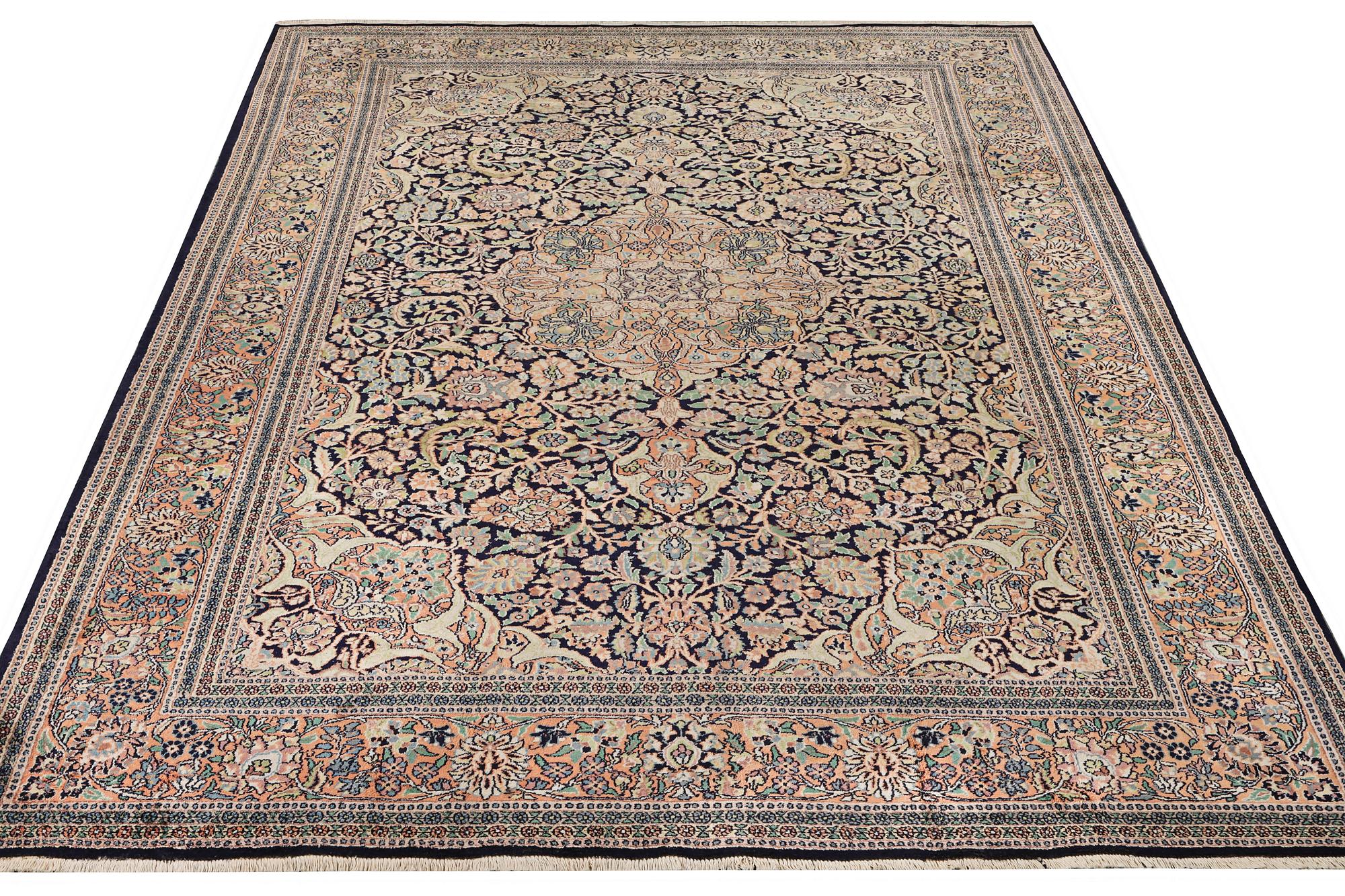 A Kashmir carpet, silk, c. 333 x 234 cm.