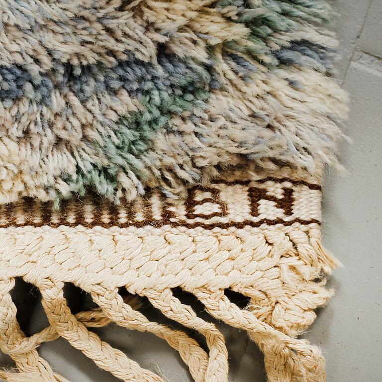 A hooked rug by Barbro Nilsson for AB Märta Måås Fjetterström, signed AB MMF BN, 185 x 102 cm.