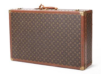 128. A Louis Vuitton travelling bag, "le loziné".