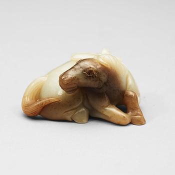 416. A nephrite figure of a recumbent horse, Qing dynasty (1644-1912).