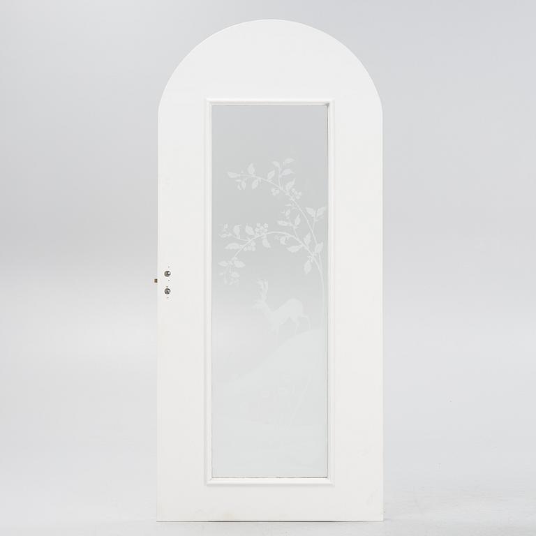 Glössner & Co, a signed glass door.