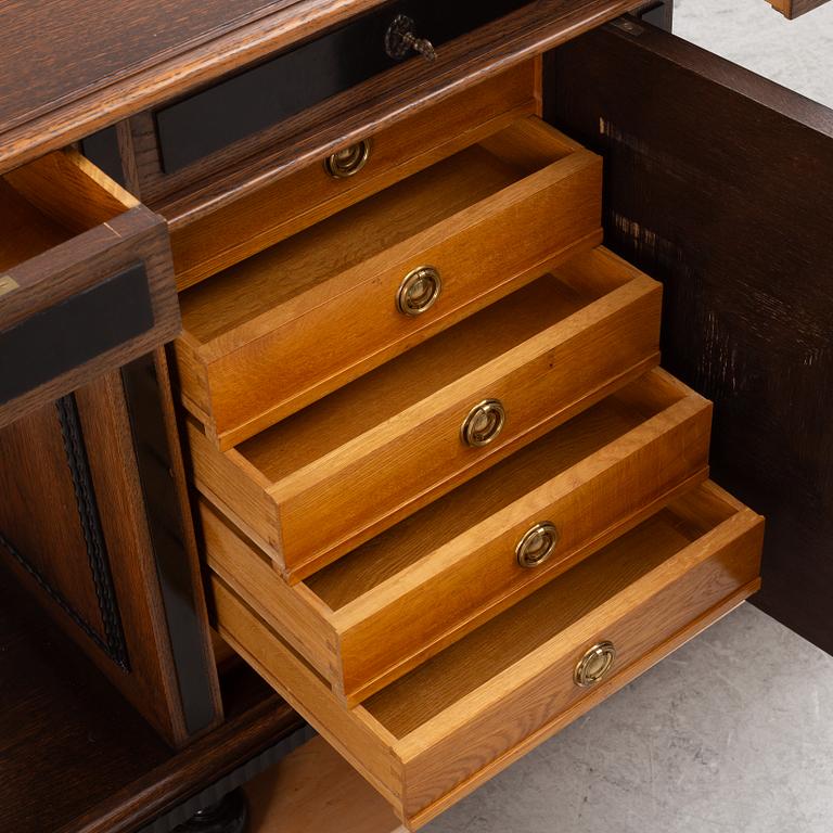 A Baroque style sideboard, Nordiska Kompaniet, Sweden, 1920's.