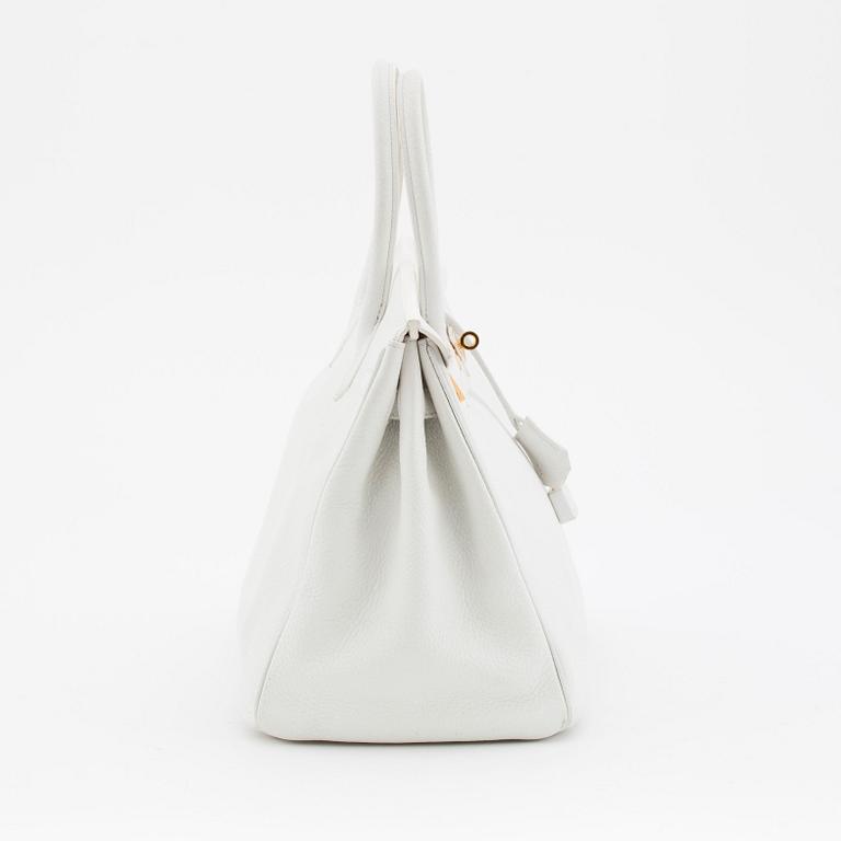 HERMÈS, a Tourillon clemence white handbag, "Birkin 35".
