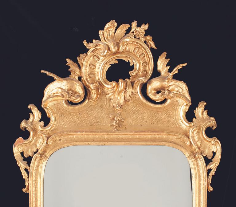 A Swedish Rococo mid 18th century mirror in the manner of C. Hårleman.
