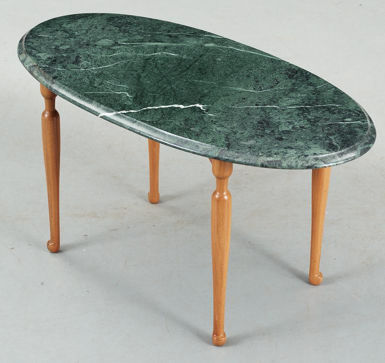 A Josef Frank green marble top table and mahogany by Svenskt Tenn.