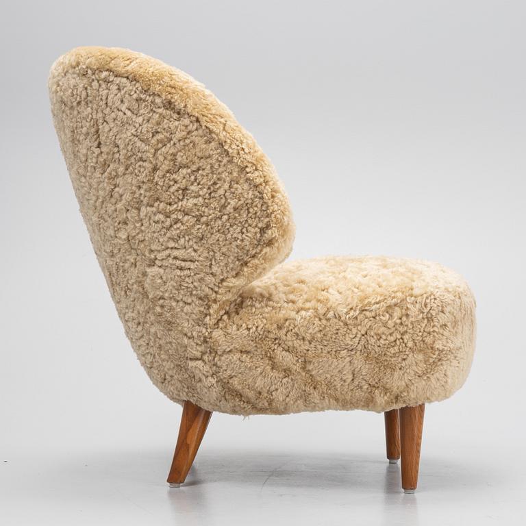 Sven Staaf, a model '1765' sheepskin upholstered easy chair, Swedish Modern, 1940's.