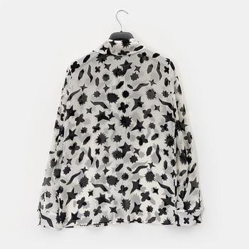 Yves Saint Laurent, a silk blouse, size 36.