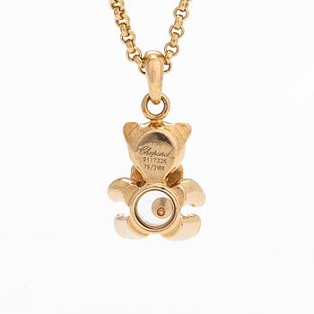 Chopard, an 18K gold 'Happy Diamonds Teddy Bear' pendant necklace.