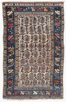 An antique Hamadan rug, c. 188 x 114 cm.