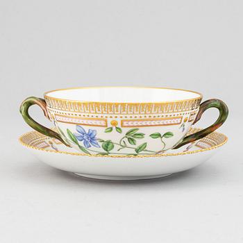 Royal Copenhagen, A 'Flora Danica' porcelain soup cup with saucer.