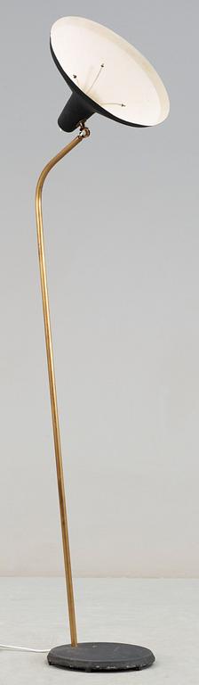 A Greta Magnusson Grossman 'G-10' black lacquered metal and brass floor lamp by Bergboms, Sweden 1950's.