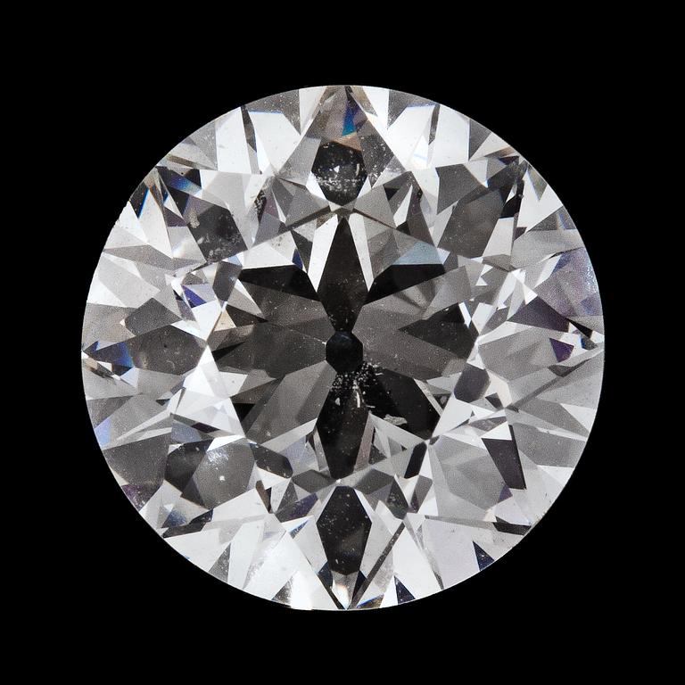 An old cut diamond, loose. Weight 3.02 cts.