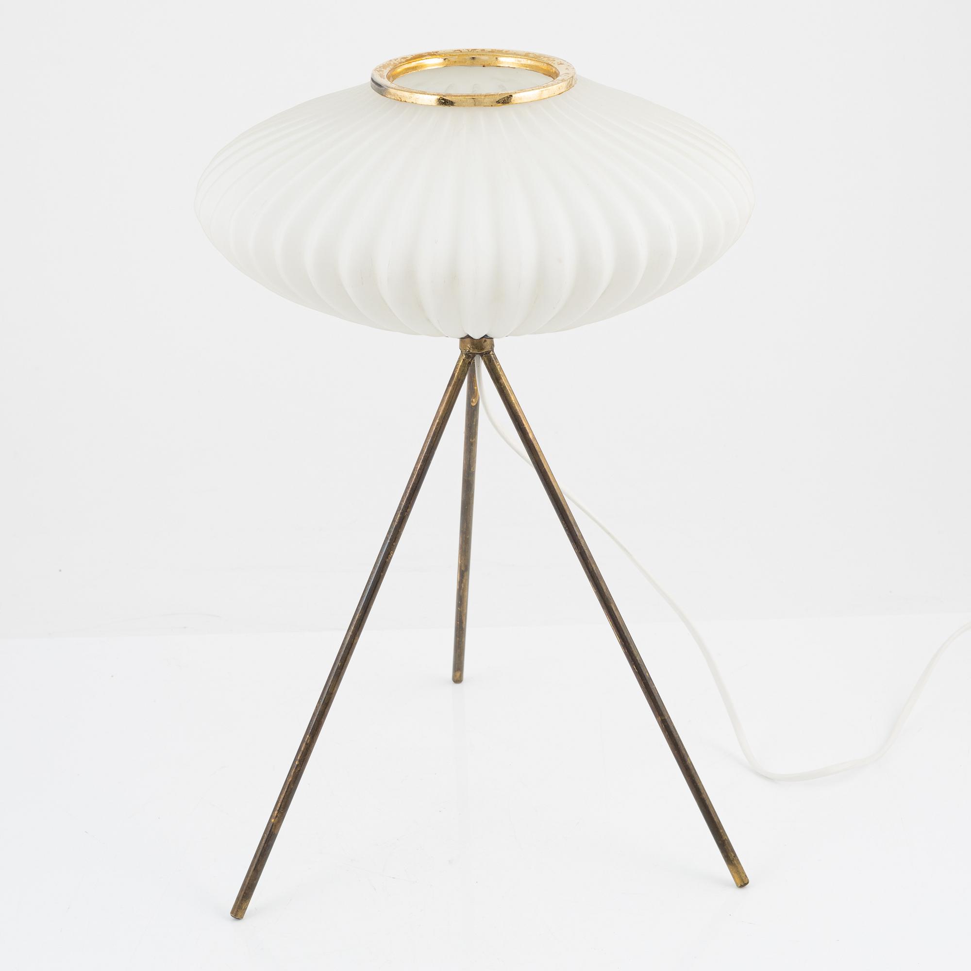 A glass and metal table lamp, probably Italy, 1960s.