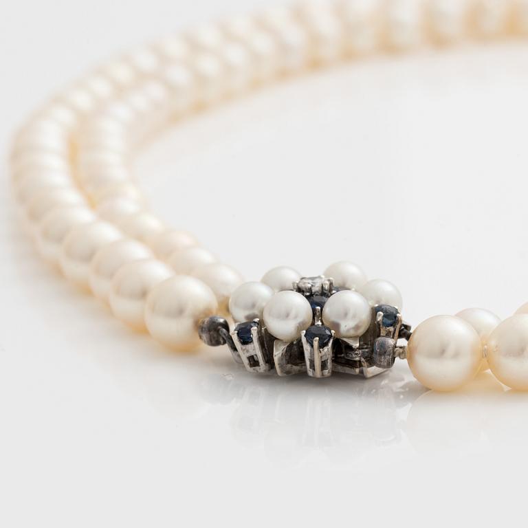 A two strand cultured pearl necklace.