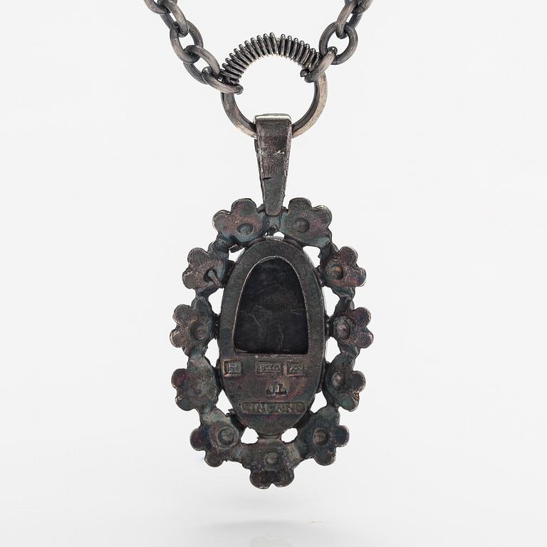 Jorma Laine, A silver necklace "Lemmikki" witha spectrolite. Turun Hopea, Turku.