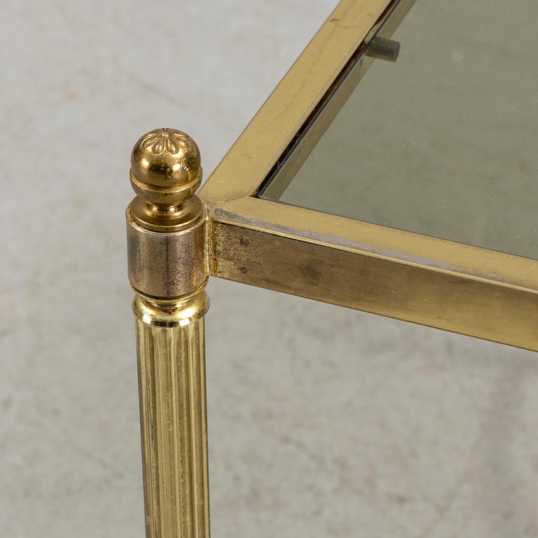 A brass and glass coffee table from the second half of the 20th century.