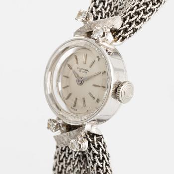 White gold and brilliant cut diamond cocktail watch.