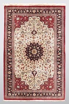 A carpet, Silk Qum, ca 116 x 75 cm.