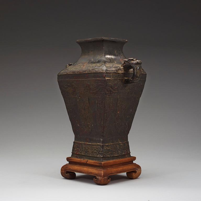 An archaistic bronze beaker vase.