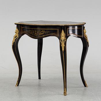 A Louis XV style table, early 20th Century.