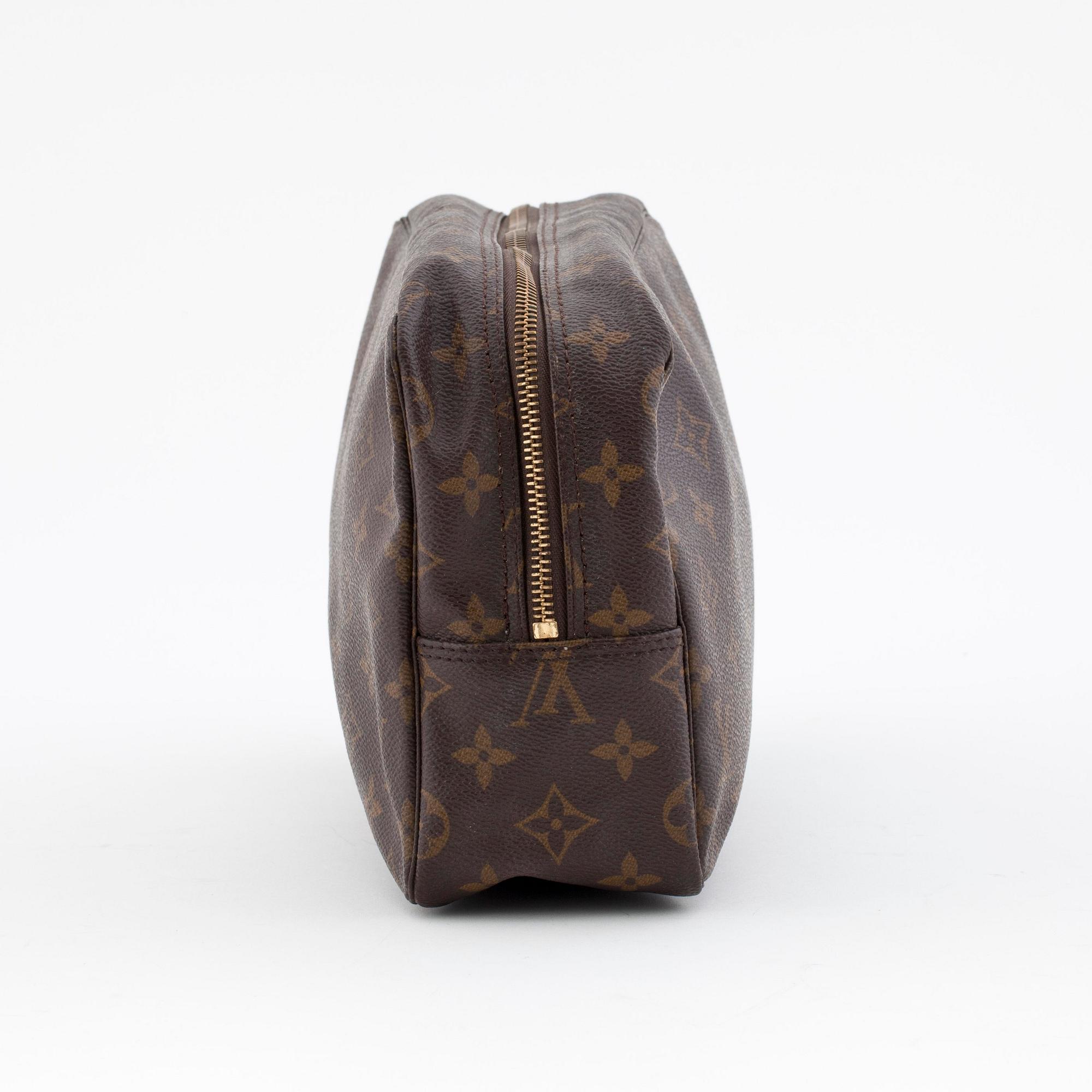 LOUIS VUITTON, a monogram canvas toiletry case.