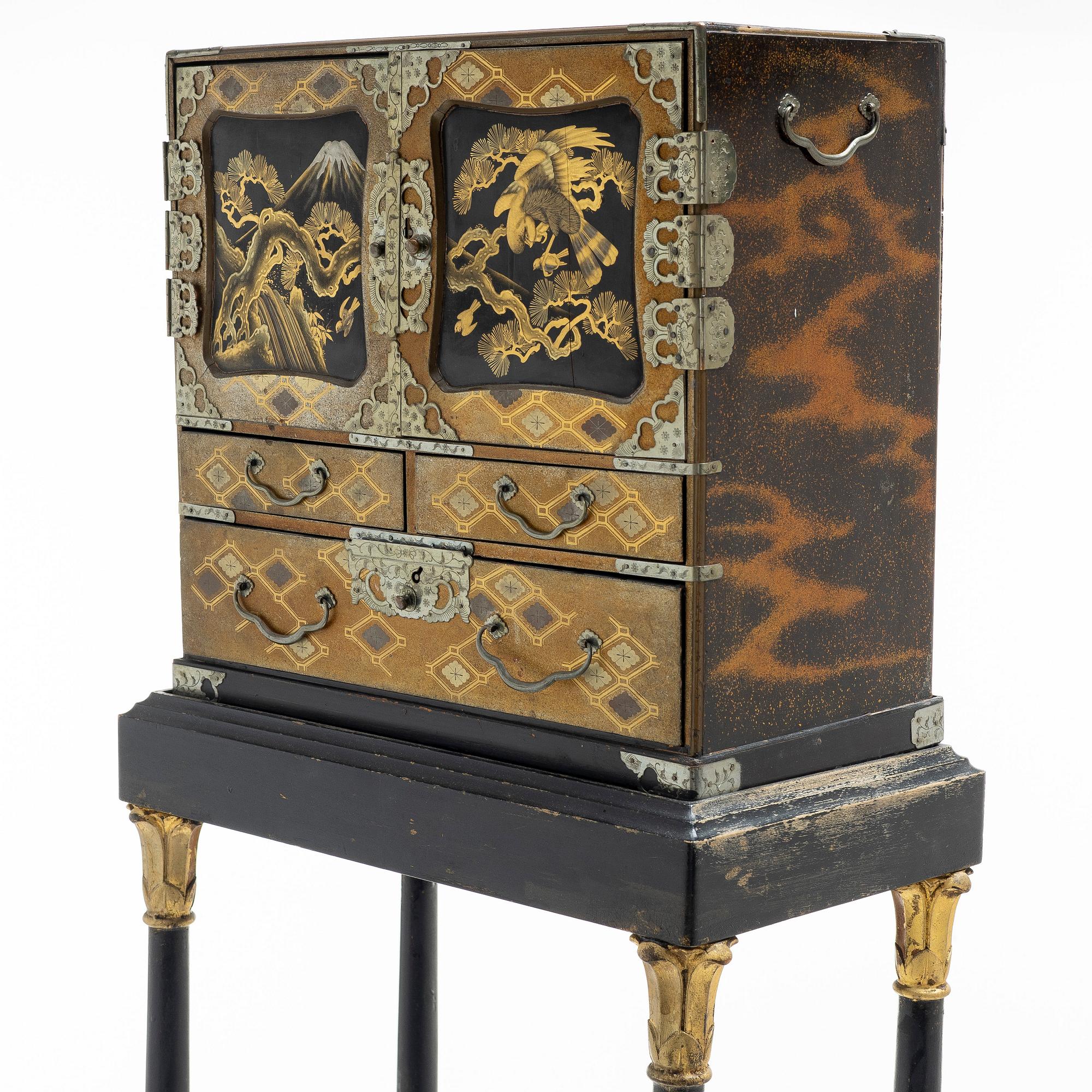 A maki-e cabinet on stand, Japan, 19th century.
