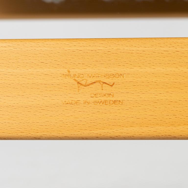 Bruno Mathsson, a 'Miranda' armchair and ottoman, Bruno Mathsson International, Värnamo, 2001.