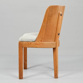 A set of eight Axel Einar Hjorth stained pine 'Lovö' chairs, Nordiska Kompaniet.