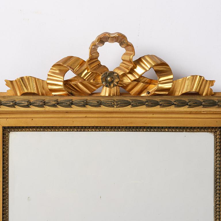 A pair of two-branch giltwood girandole mirrors attributed to P. Ljung (1743-1819).