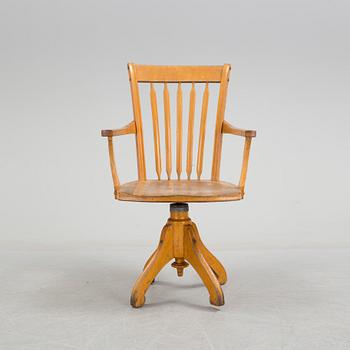 a writing desk chair from the early 20th century.