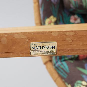 A Bruno Mathsson Swedish Modern chair with attached reading table, Karl Mathsson, Värnamo 1944.