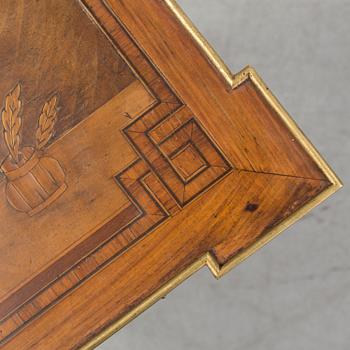 A Louis XVI-style circa 1900 occasional table.