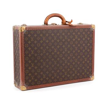 230. LOUIS VUITTON, a monogram canvas suitcase, "Alzer".