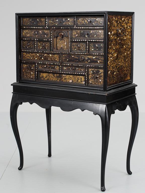 A Japanese black lacquer mother-of-pearl inlayed cabinet, Edo period, presumably Momoyama.