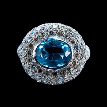 50. A RING, topaz c. 2.70 ct and 117 brilliant cut diamonds c. 1.75 ct.