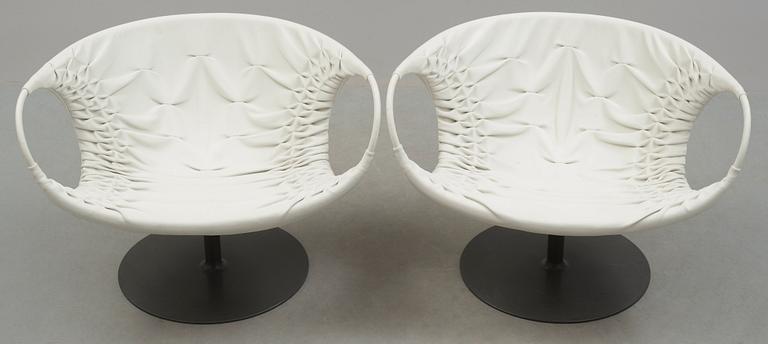 A pair of Patricia Urquiola 'Smock' steel and white leather easy chairs, Moroso, Italy.