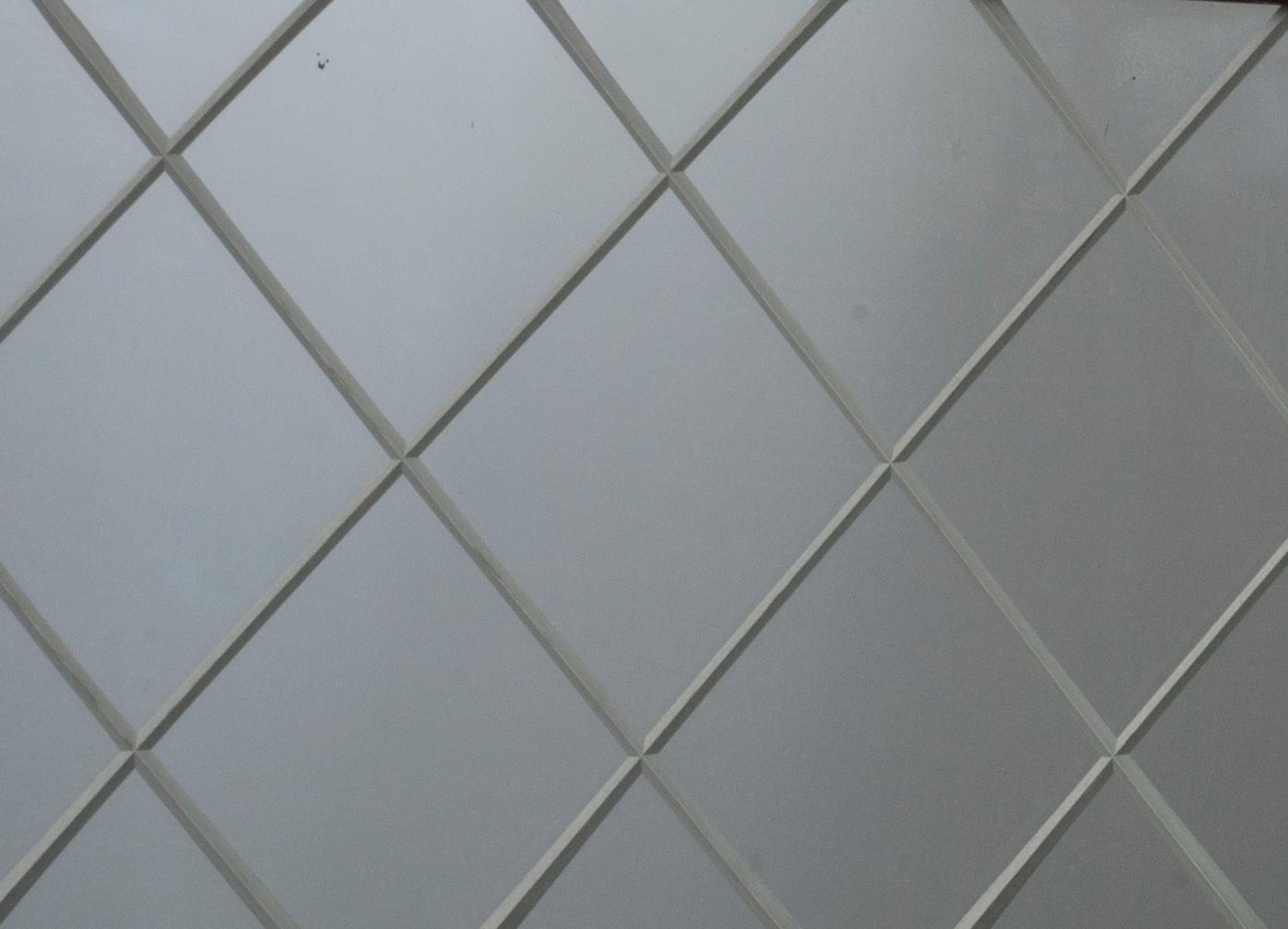 A mahogany mirror from Glas&Trä, Hovmantorp.