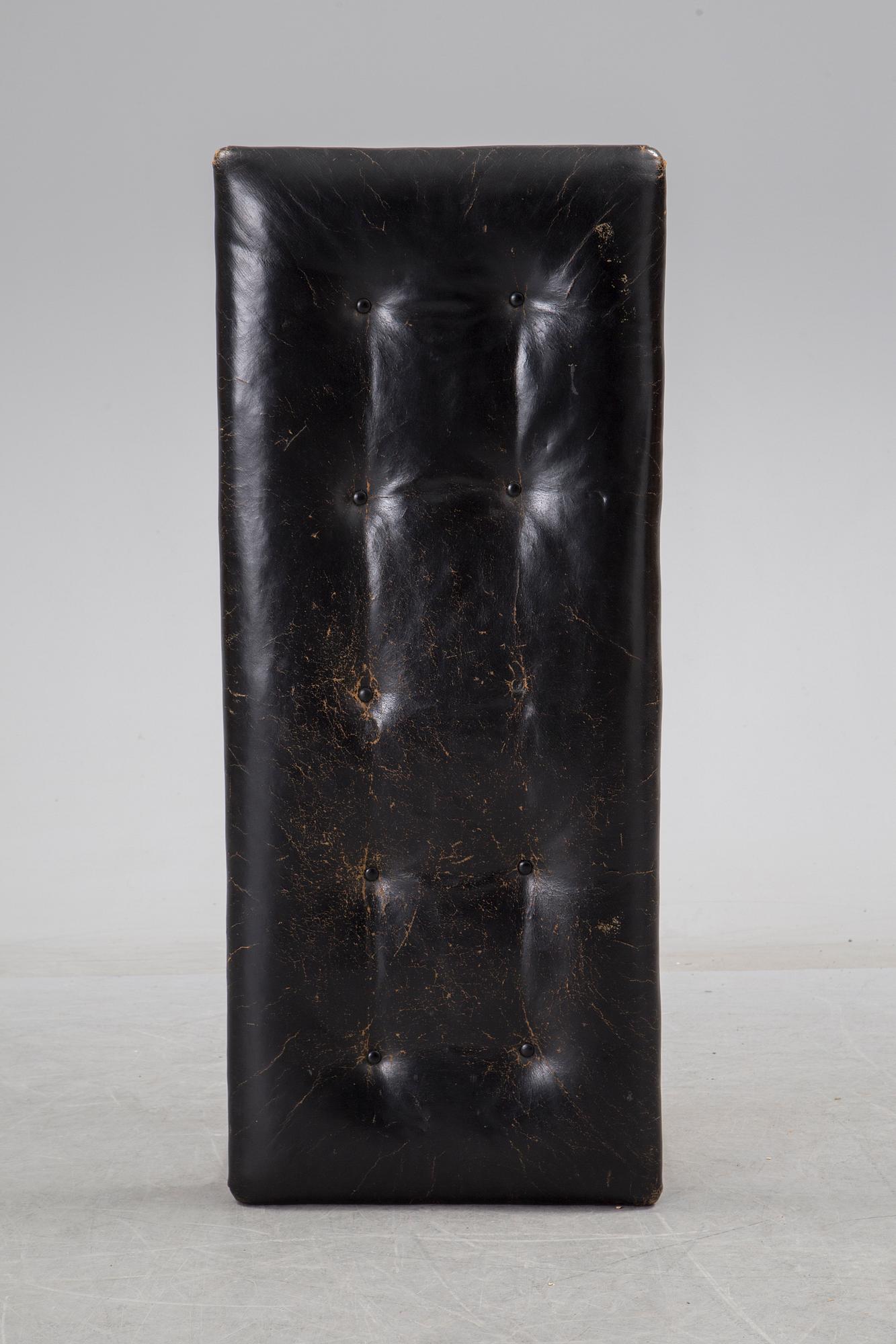 JOSEF FRANK, leather stool/bench, Firma Svenskt Tenn, model 2082.