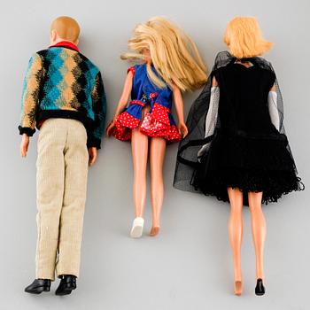 Three 1960s Barbie dolls with accessories, Mattel.