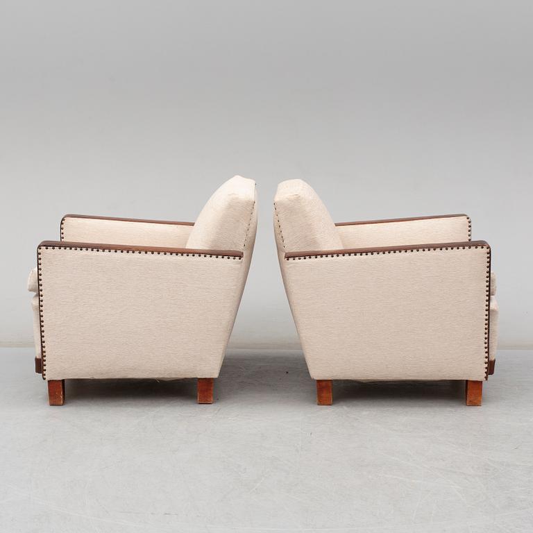 A 1930's pair of model 184 easy chairs by Björn Trägårdh, Firma Svenskt Tenn.