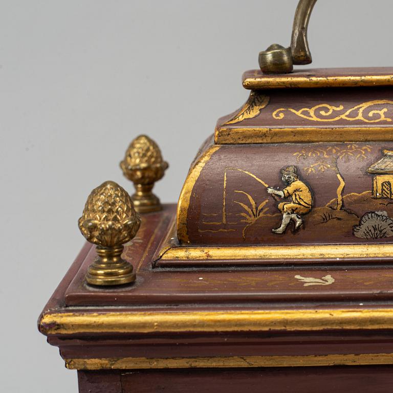 An 18th century table clock.