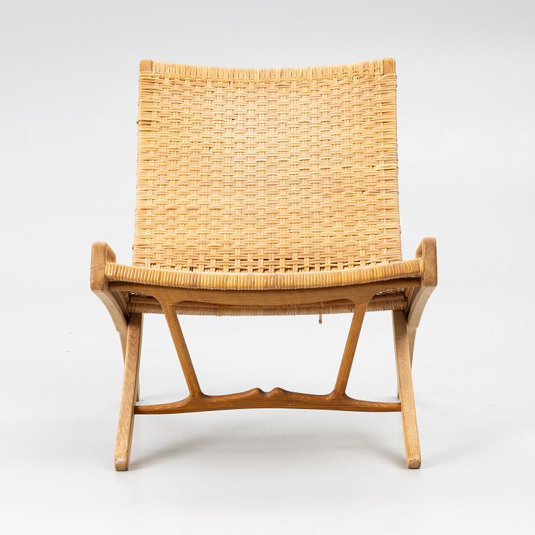 Hans J. Wegner, A folding chair, JH 512, Johannes Hansen, Denmark.