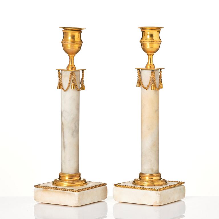 A pair of late Gustavian candlesticks.