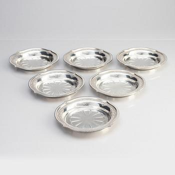 A French 20th century set of 24 pieces silver tableware, marks of Savary, Paris.