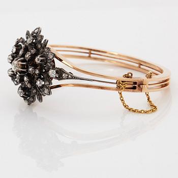 A 14K gold and silver bangle set with old- and rose-cut diamonds.